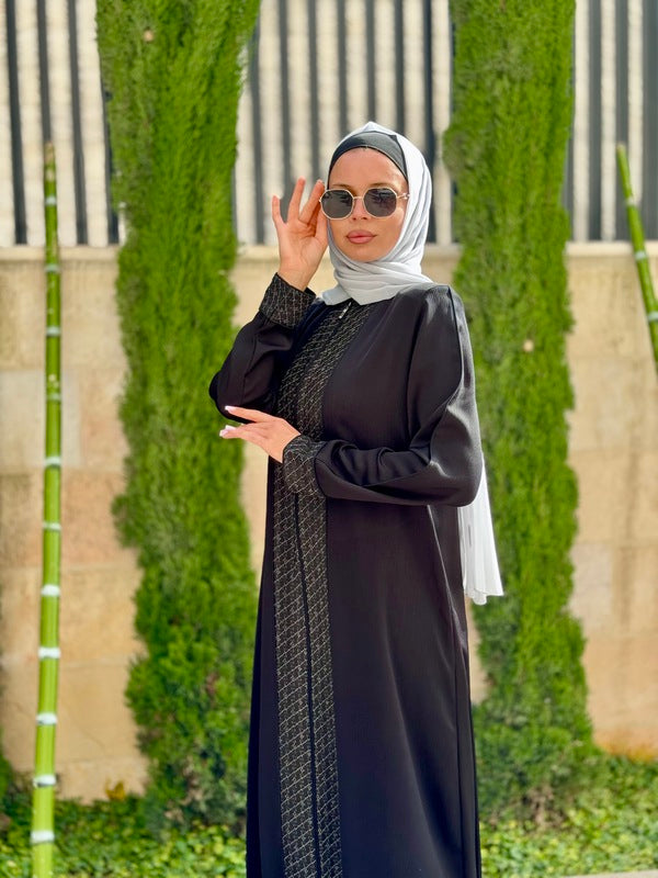 
                  
                    Modern and Elegant Black Abaya
                  
                