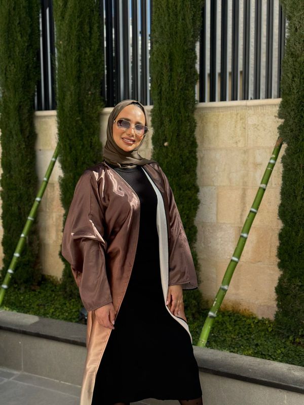 
                  
                    Colored Elegance in an Open Abaya
                  
                