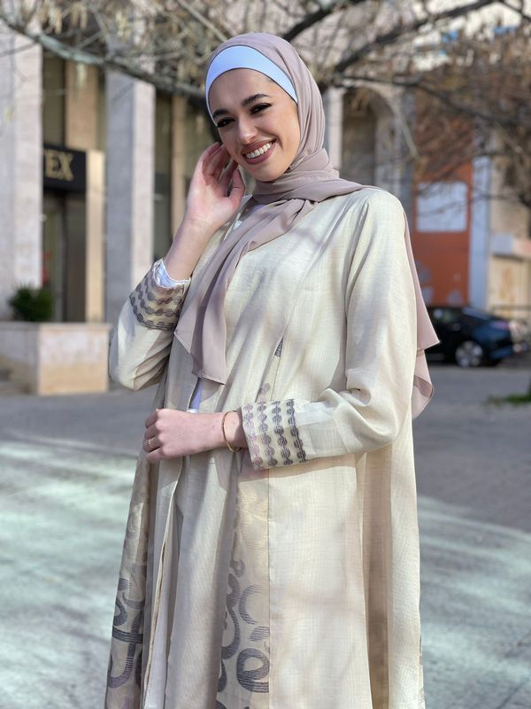 
                      
                        Embroidered Elegance in an Open Abaya
                      
                    