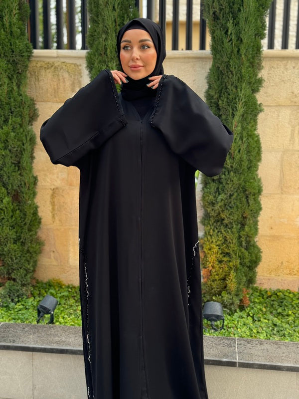 
                  
                    Black Abaya with Emirati Bead Elegance
                  
                