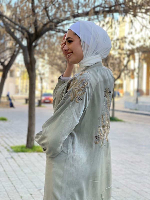 
                      
                        Embroidered Turkish Abaya  with Pearl Essence
                      
                    