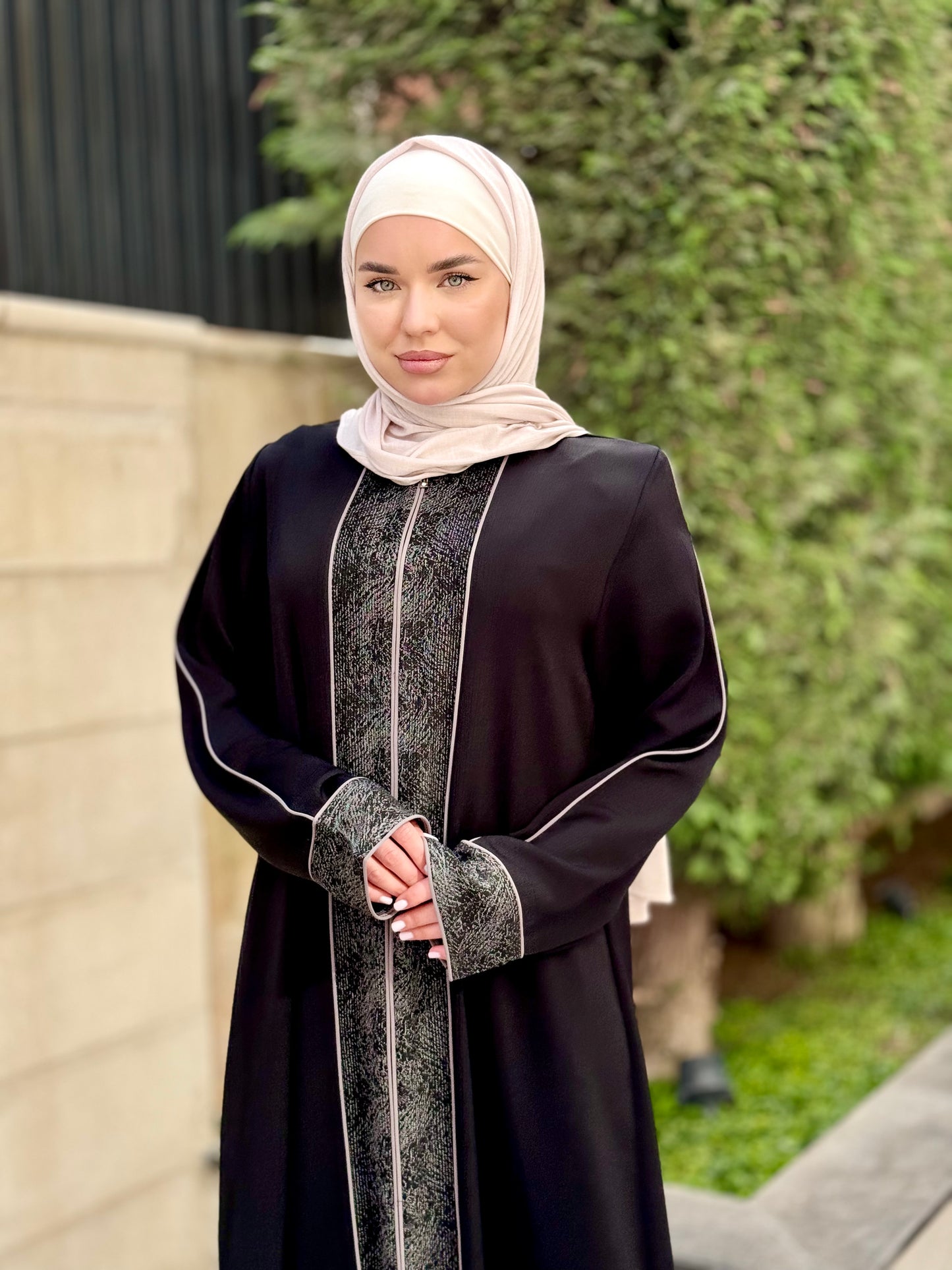 
                  
                    Modern and Elegant Black Abaya
                  
                