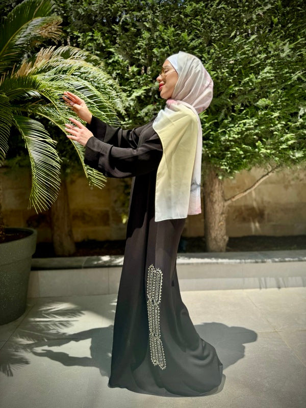 
                      
                        Elegant and Practical Black Abaya
                      
                    