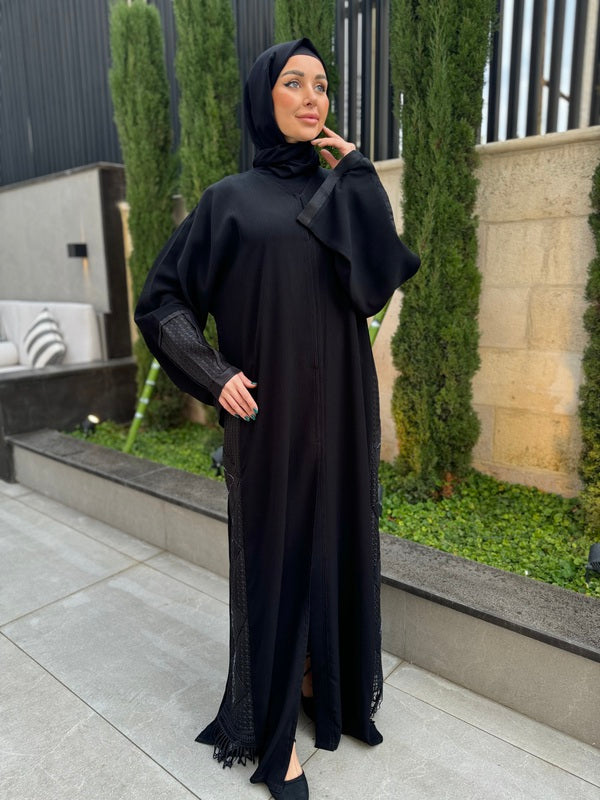 
                  
                    Black Abaya with Embroidery and Beaded Patterns
                  
                