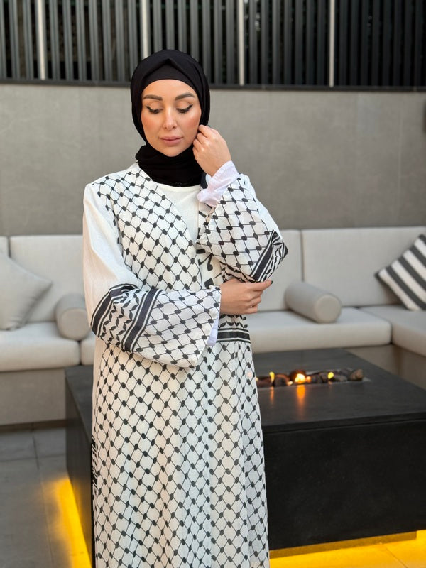 
                  
                    Chic Abaya with Heritage and Sophistication
                  
                