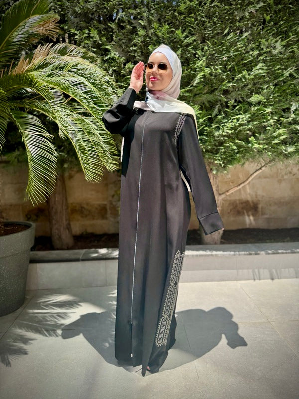 
                      
                        Elegant and Practical Black Abaya
                      
                    