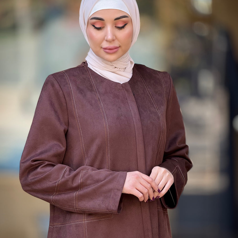 
                      
                        Unique Suede Abaya
                      
                    