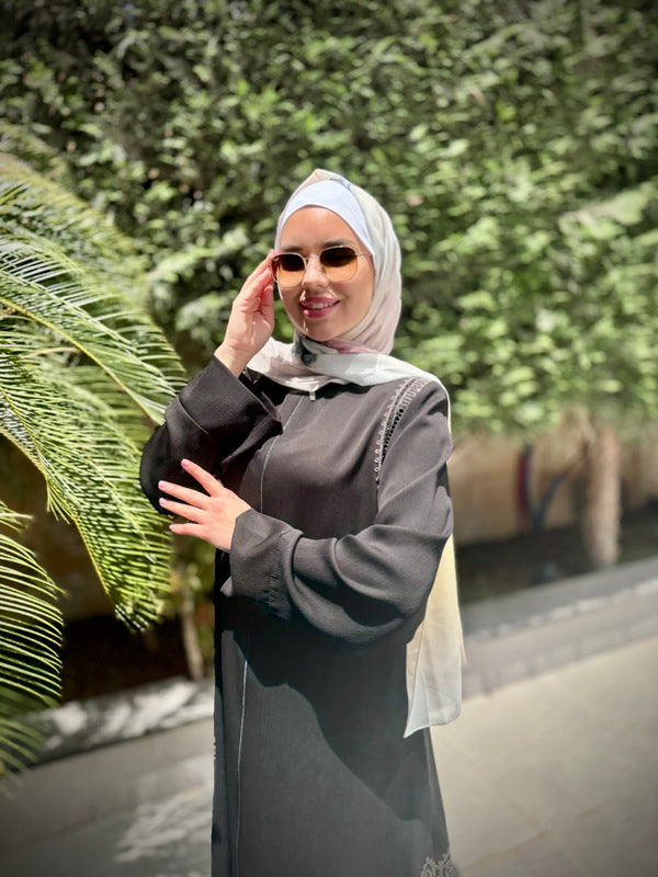 
                      
                        Elegant and Practical Black Abaya
                      
                    