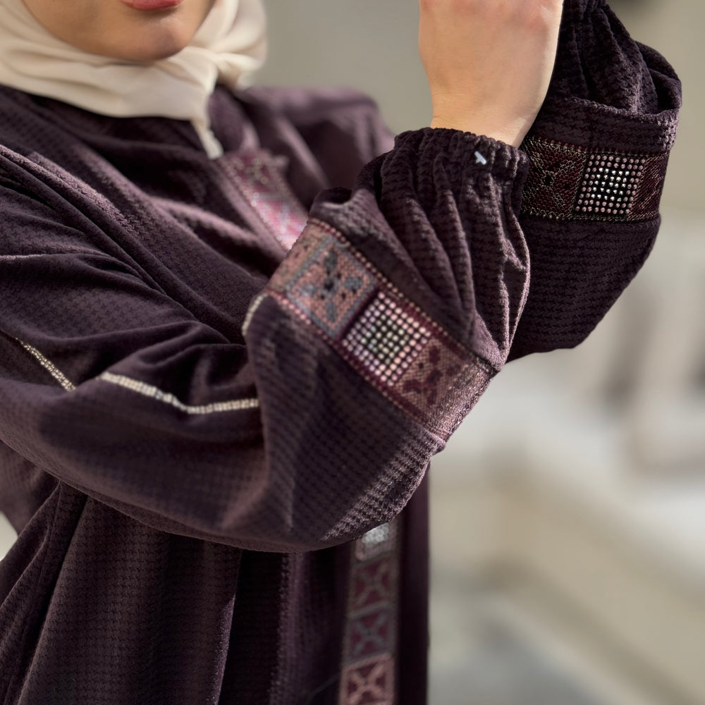 
                      
                        Elegant Winter Abaya With Modern Embroidery
                      
                    