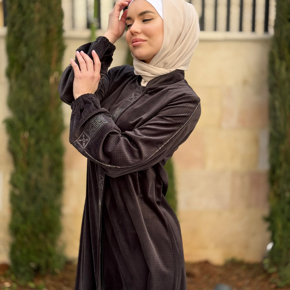 
                      
                        Elegant Winter Abaya With Modern Embroidery
                      
                    