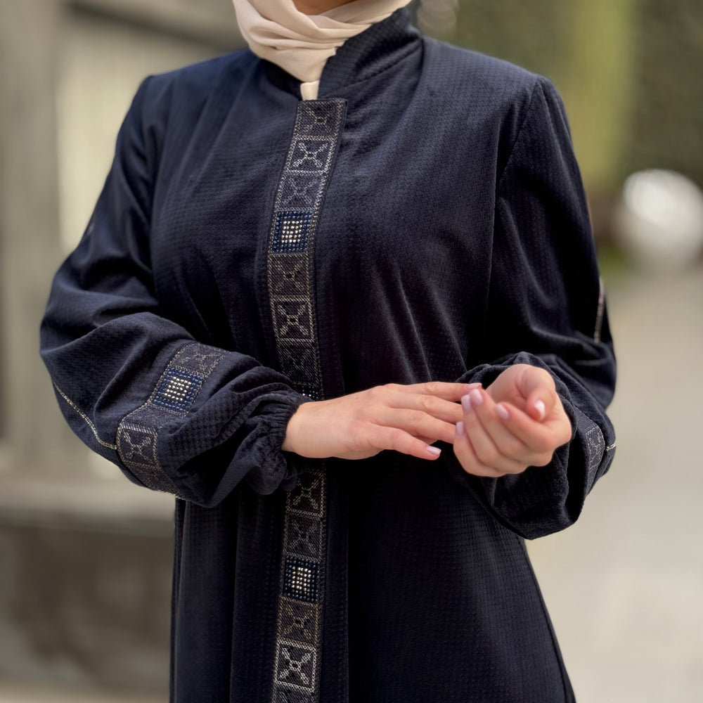 
                      
                        Elegant Winter Abaya With Modern Embroidery
                      
                    