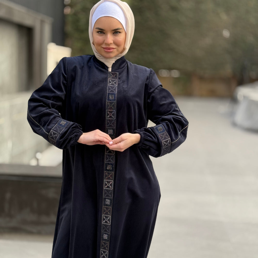 
                      
                        Elegant Winter Abaya With Modern Embroidery
                      
                    