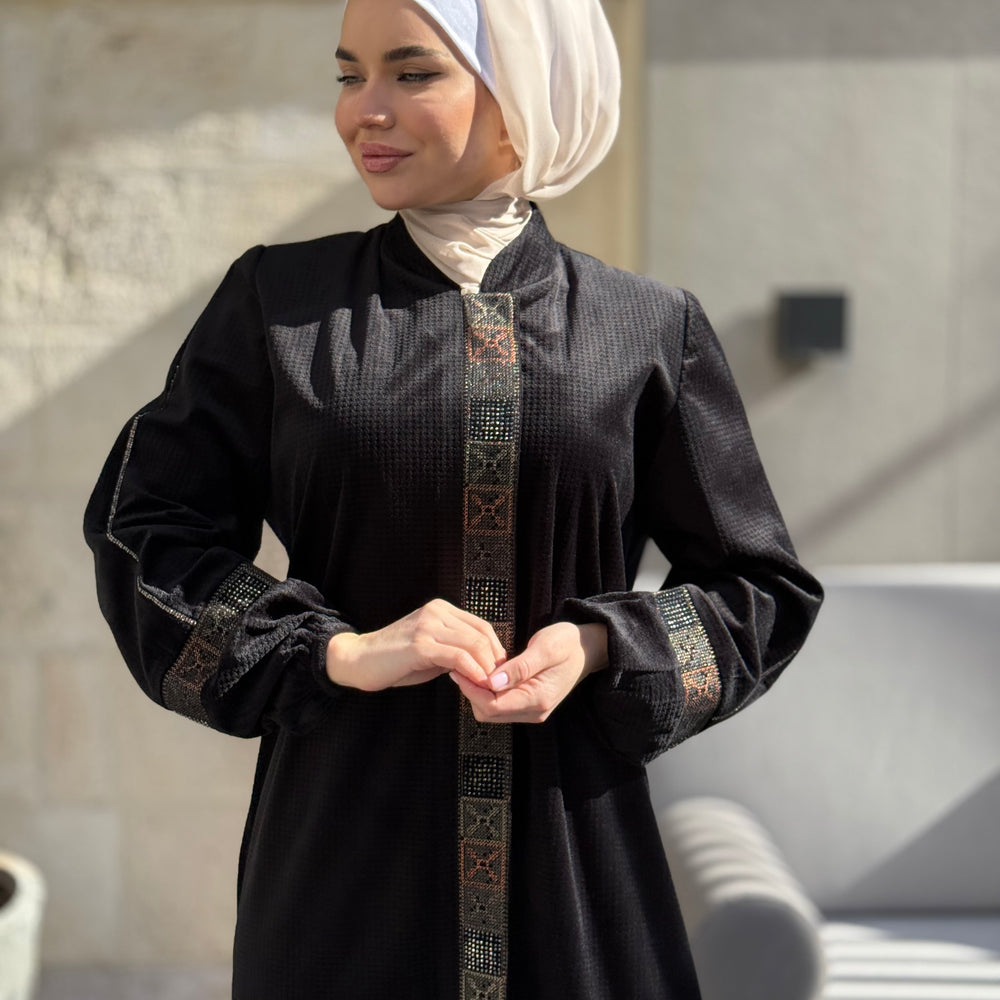 
                      
                        Elegant Winter Abaya With Modern Embroidery
                      
                    