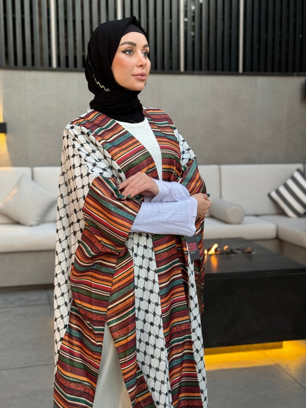 
                  
                    Unique Open-Front Abaya Blending Heritage and Sophistication
                  
                