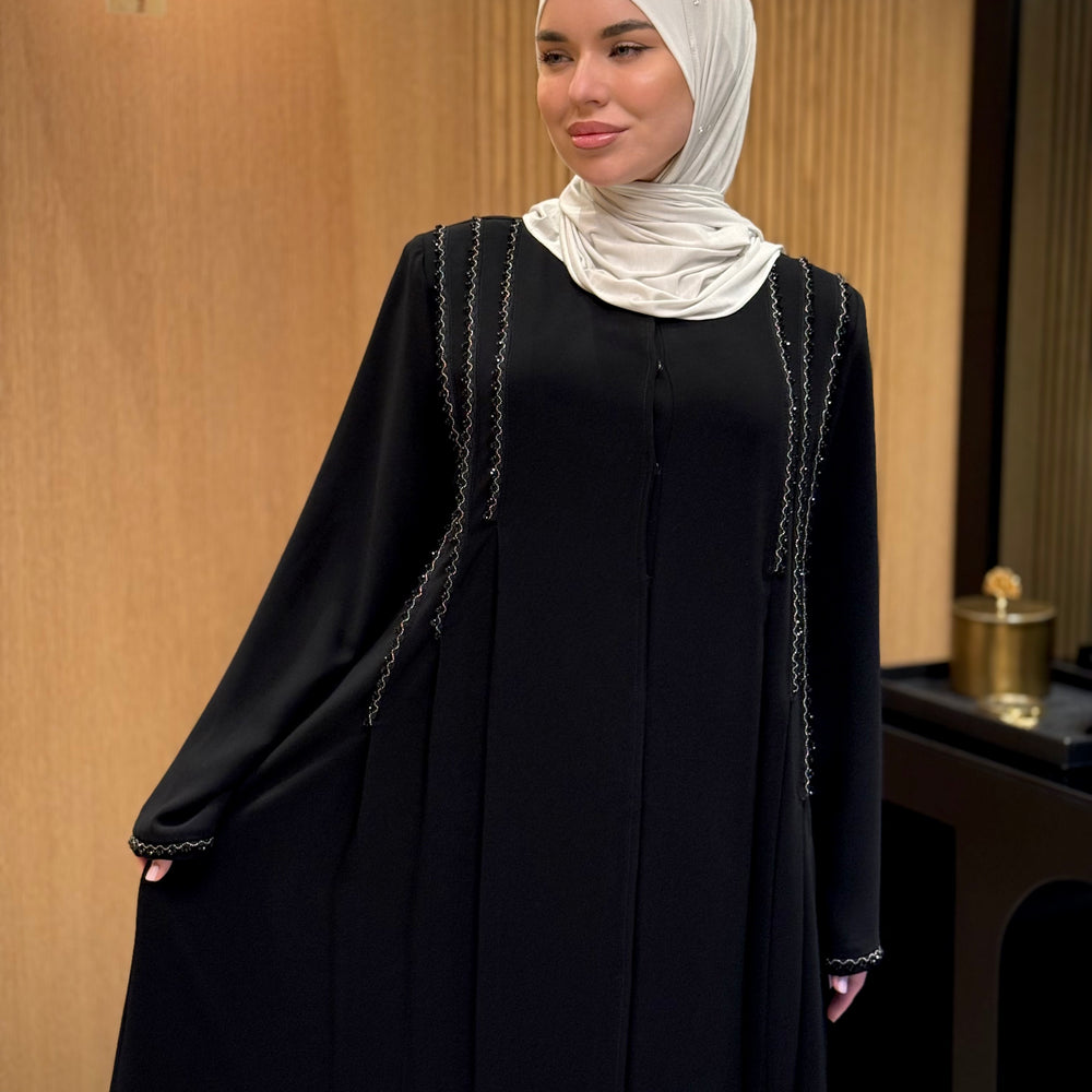 An elegant black abaya with beads