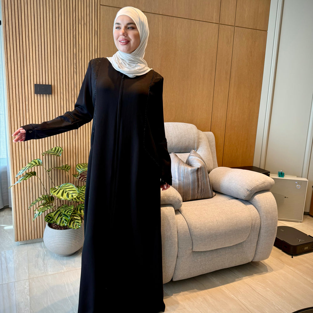 
                      
                        Unique Black Abaya With Embroidery
                      
                    