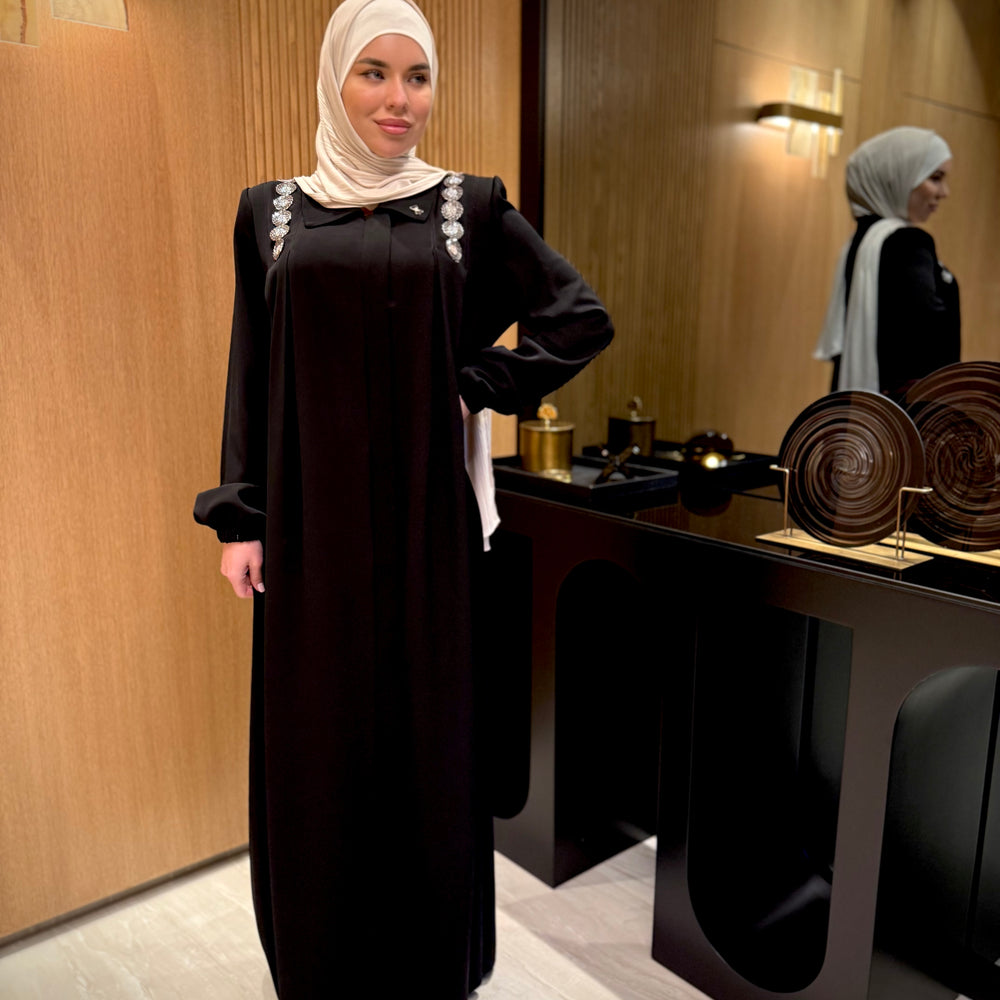 
                      
                        Modern And Stunning Black Abaya
                      
                    