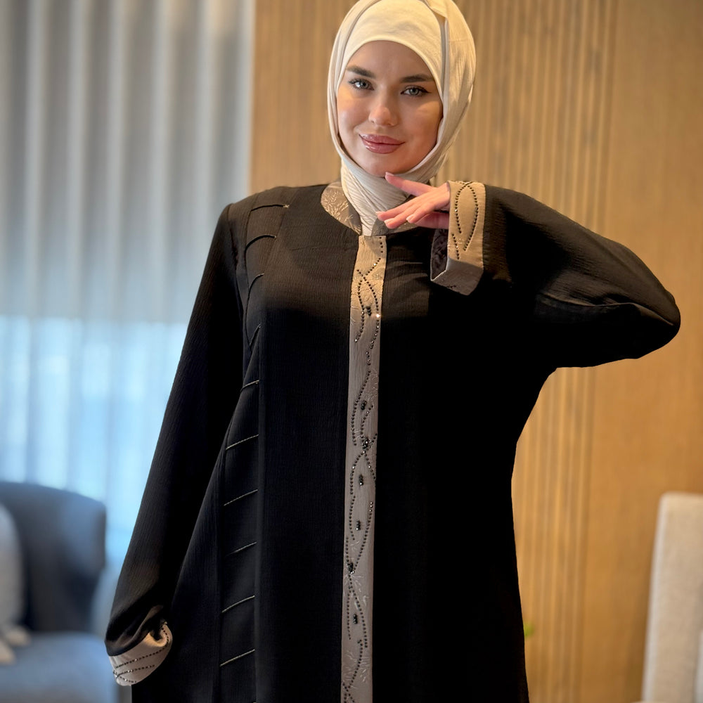 
                      
                        Unique Abaya With Beaded Details
                      
                    