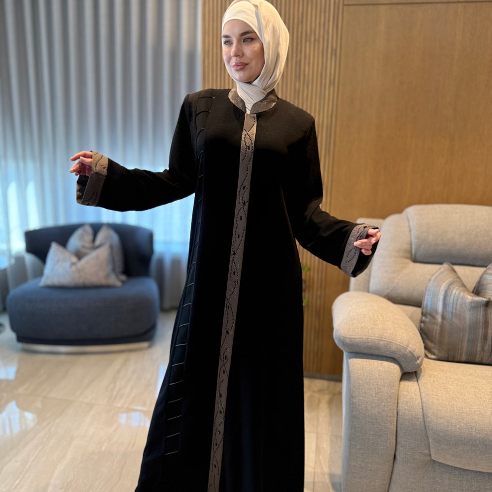 
                      
                        Unique Abaya With Beaded Details
                      
                    