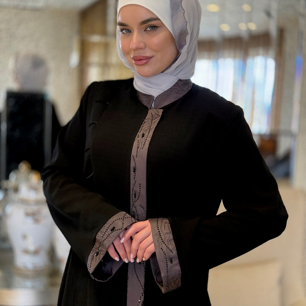 
                      
                        Unique Abaya With Beaded Details
                      
                    