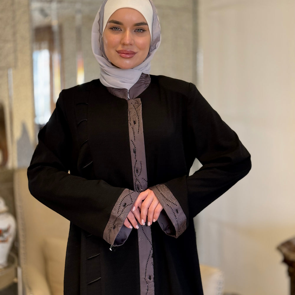 
                      
                        Unique Abaya With Beaded Details
                      
                    