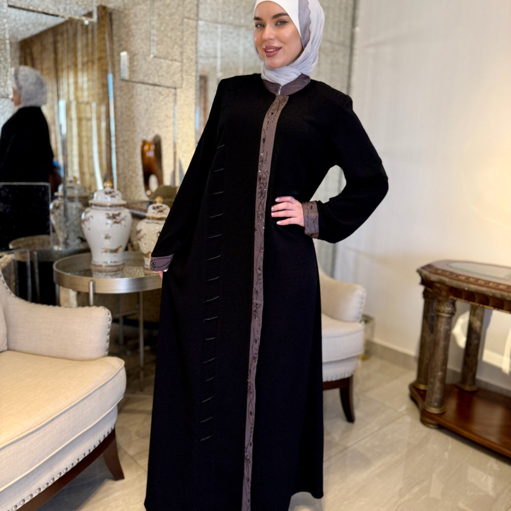 
                      
                        Unique Abaya With Beaded Details
                      
                    