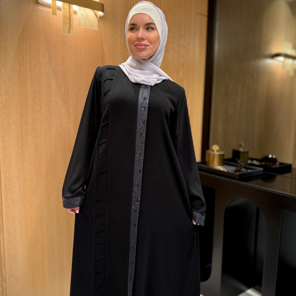 
                      
                        Unique Abaya With Beaded Details
                      
                    