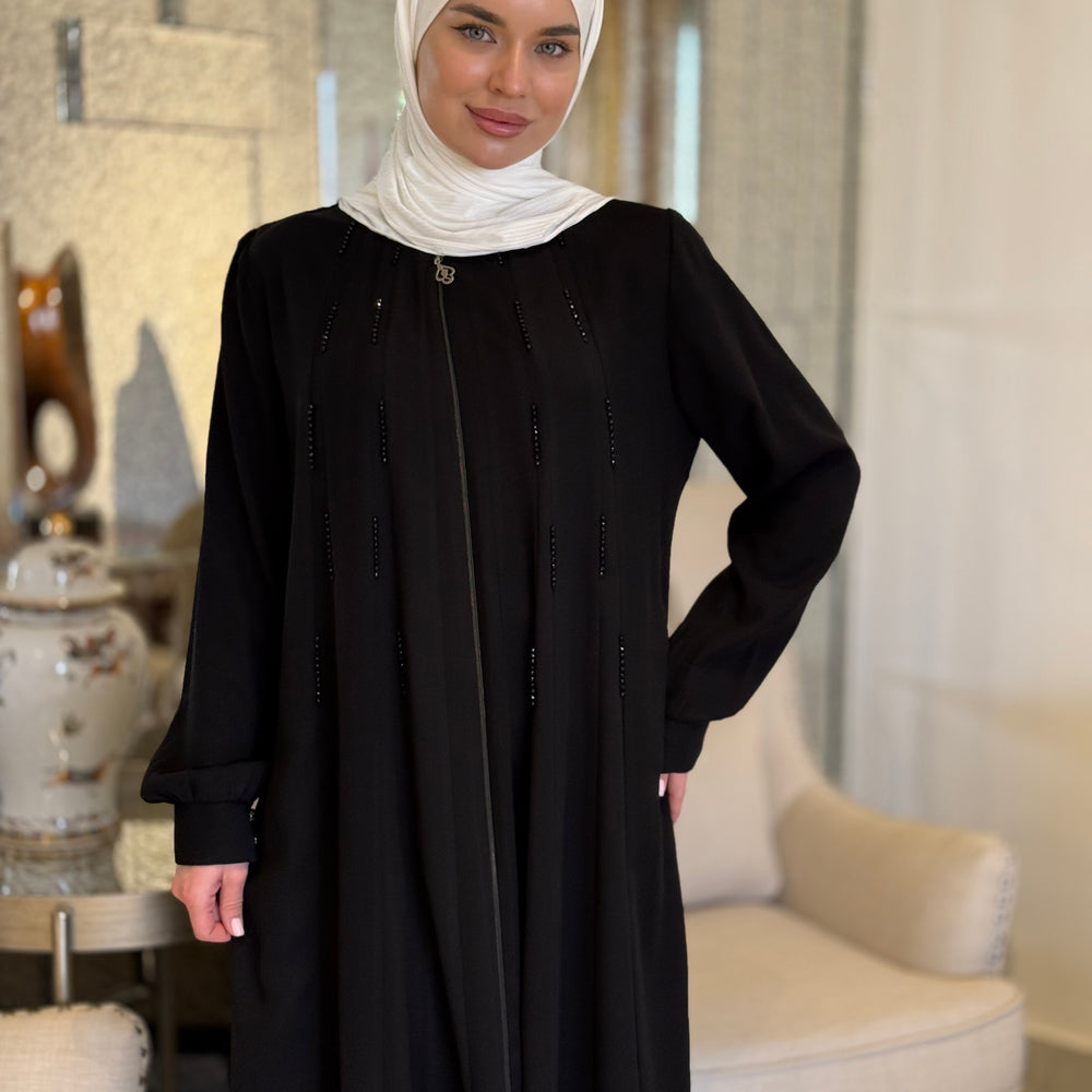 
                      
                        Elegant Black Abaya For Modern Look
                      
                    