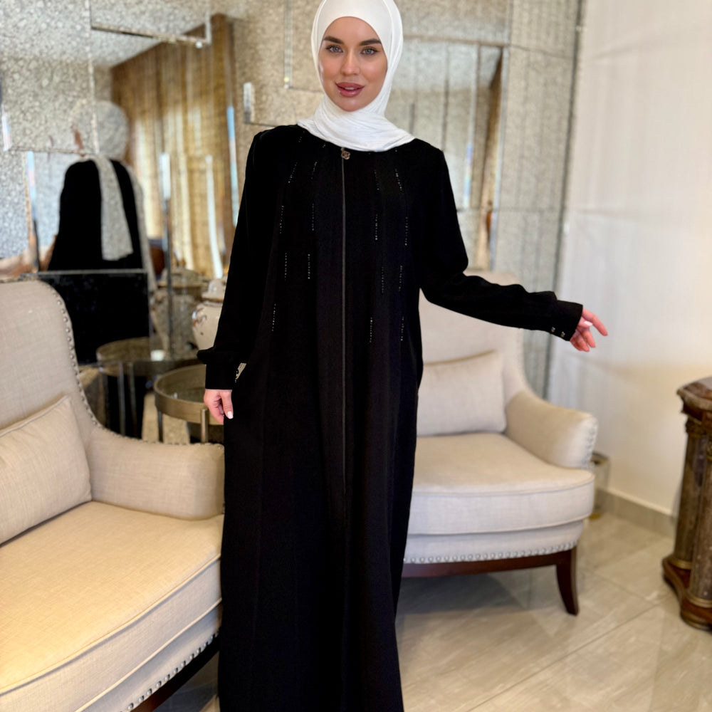 
                      
                        Elegant Black Abaya For Modern Look
                      
                    