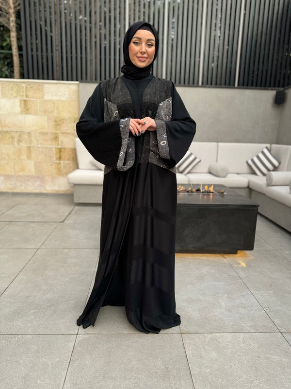 
                  
                    Emirati Black Velvet Abaya with Unique Fabric
                  
                