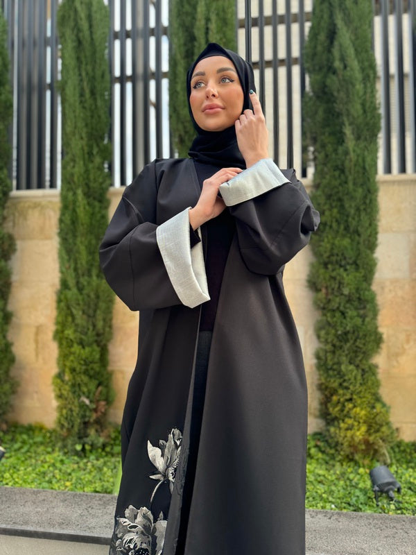 
                  
                    Black Charm Emirati Abaya with Front Embroidery
                  
                