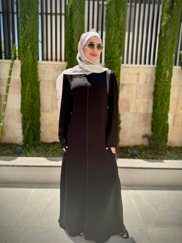 
                      
                        Elegant and Practical Black Abaya
                      
                    