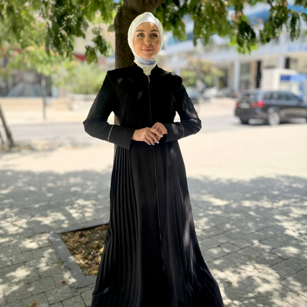 
                      
                        Elegant And Distinctive Jilbab
                      
                    