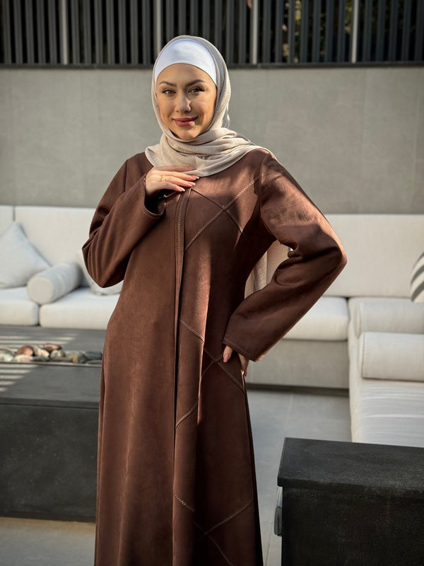 
                  
                    Chic Winter Suede Abaya with Embroidered Details
                  
                