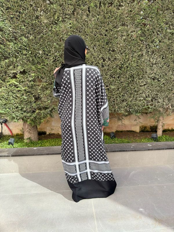 
                  
                    Black Embroidered Unique Abaya
                  
                
