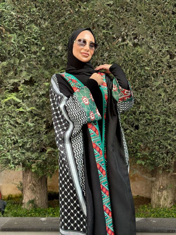 
                  
                    Black Embroidered Unique Abaya
                  
                
