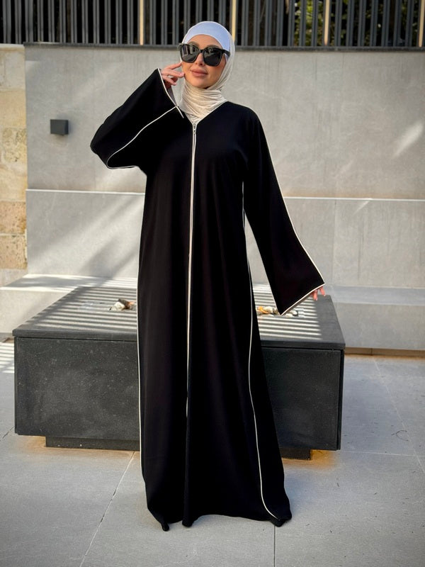 
                      
                        Sleek Simplicity Modern Abaya
                      
                    