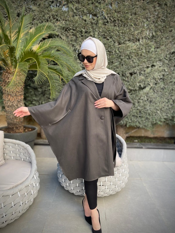 
                  
                    Elegant Wool Cape with Subtle Embroidery
                  
                