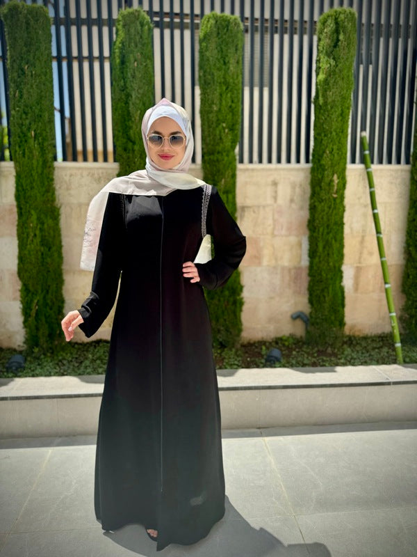 
                      
                        Elegant and Practical Black Abaya
                      
                    