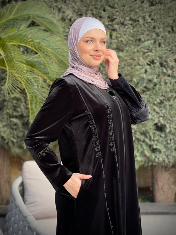 
                  
                    Black Velvet Winter Abaya with Stylish Details
                  
                