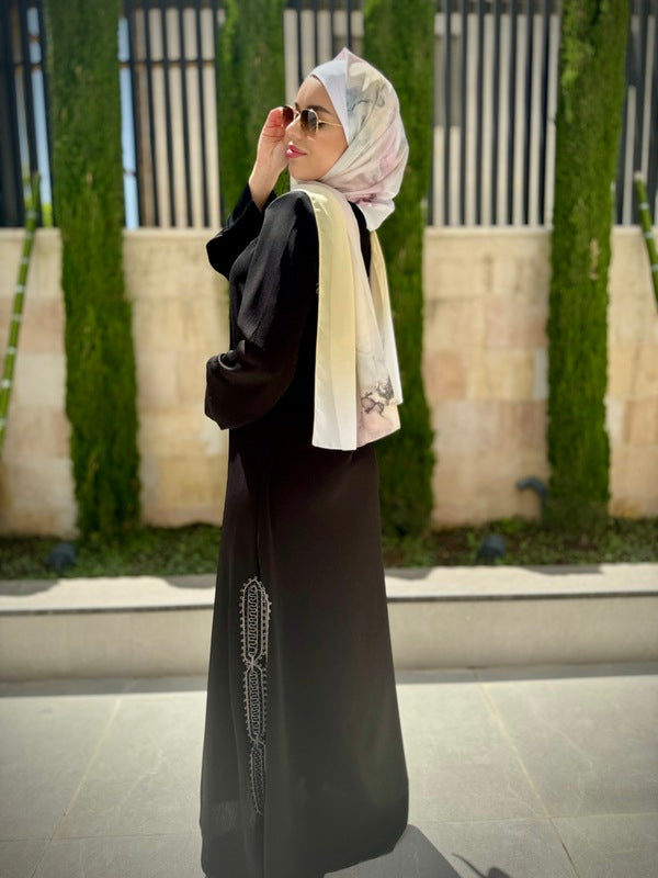 
                      
                        Elegant and Practical Black Abaya
                      
                    