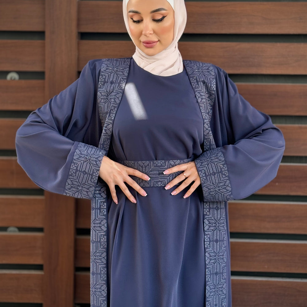 
                      
                        Unique Embroidered Abaya
                      
                    