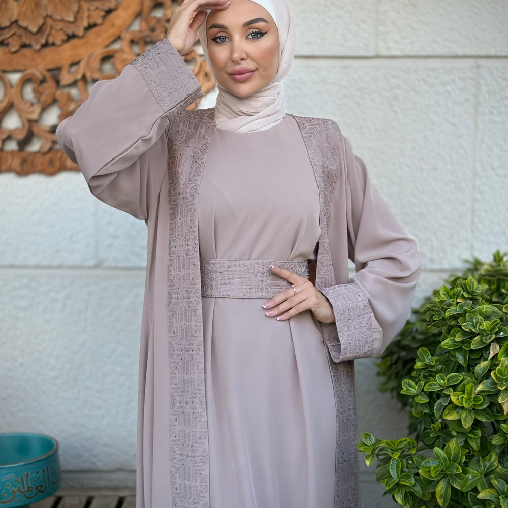 
                      
                        Unique Embroidered Abaya
                      
                    