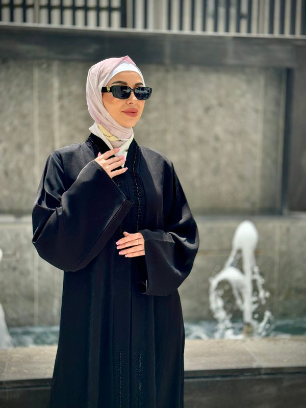 
                      
                        Black Simple and Practical Abaya
                      
                    