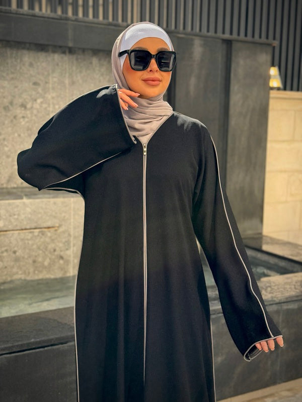 
                      
                        Sleek Simplicity Modern Abaya
                      
                    