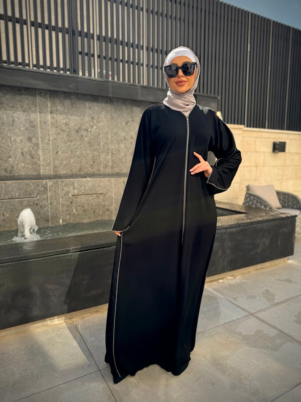 
                      
                        Sleek Simplicity Modern Abaya
                      
                    