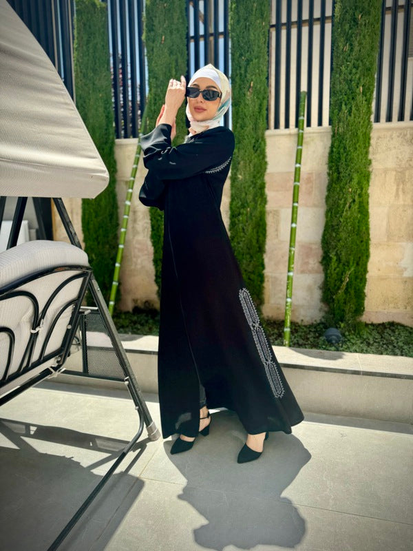 
                      
                        Elegant and Practical Black Abaya
                      
                    