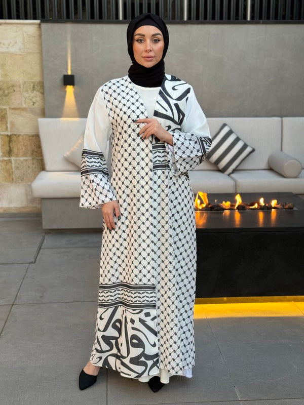 
                  
                    Chic Abaya with Heritage and Sophistication
                  
                