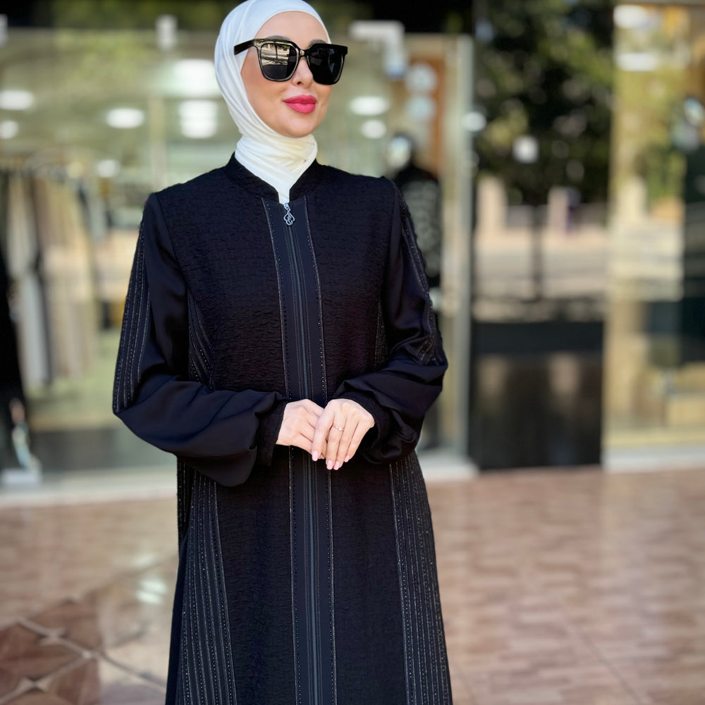 
                      
                        Elegant Abaya for a Unique Look
                      
                    