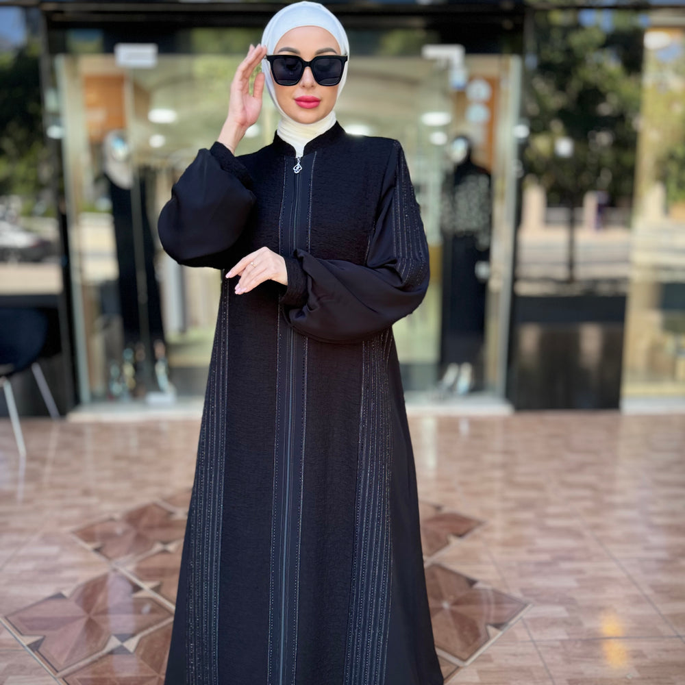 
                      
                        Elegant Abaya for a Unique Look
                      
                    